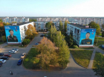 Муралы с изображением Героев России Александра Ананичева и Дениса Межуева. Посёлок Калинец Московской области