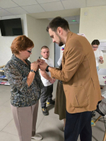 Акция ко Дню Государственного флага в пункте временного размещения